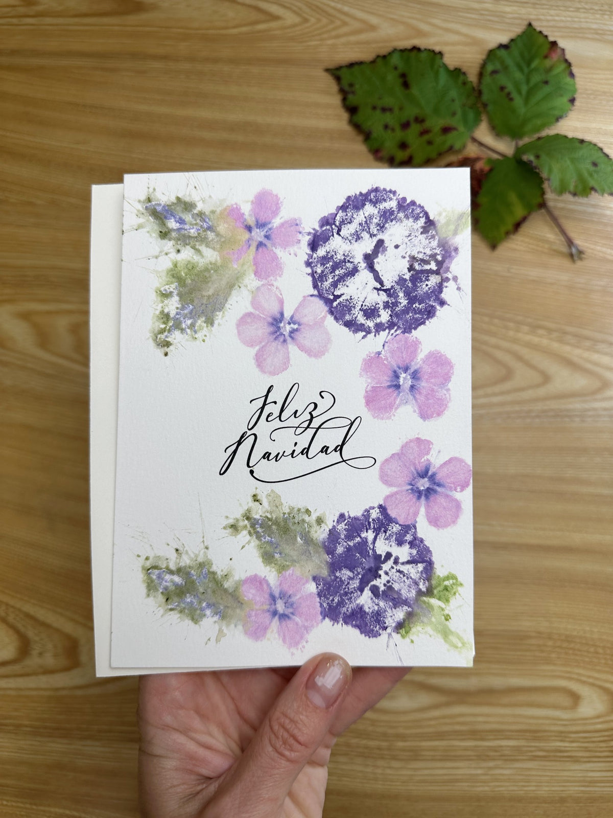 Feliz Navidad. Petunia, phlox, coleus. Watercolor paper