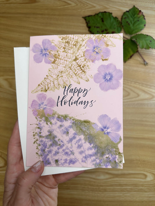 Happy Holidays. Coleus leaf, phlox and fern. Pink cardstock